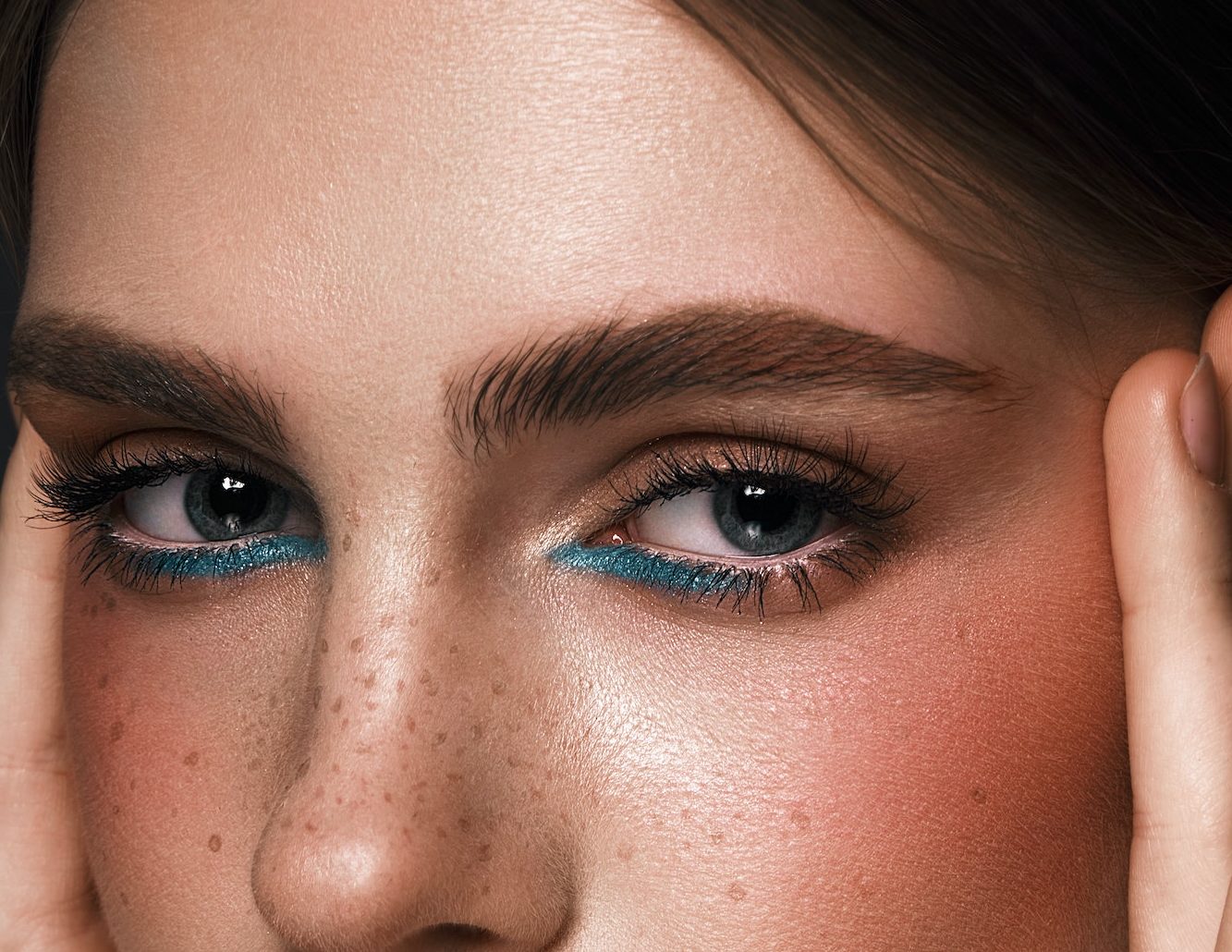 Beautiful girl with creative colorful makeup. Beauty face.