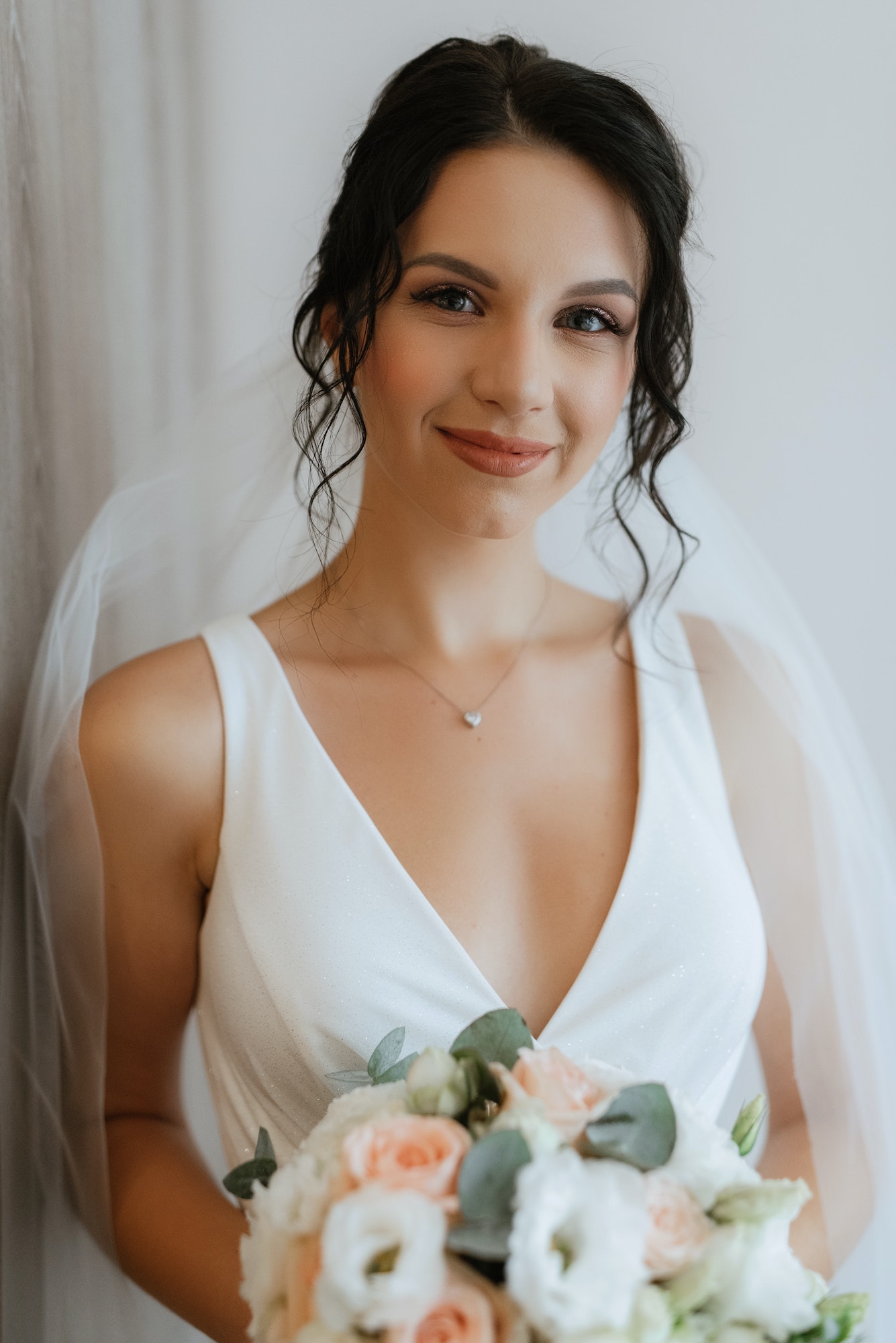 preparations for the bride with the dressing of the wedding dress